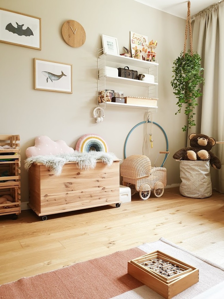 beige color kid bedroom with wooden furniture and terra cotta rug