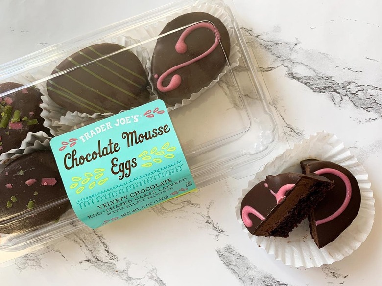 Trader Joe's Chocolate Mousse Eggs in clear plastic packaging on a white and gray marble surface.