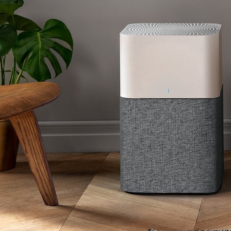 A white and grey air purifier