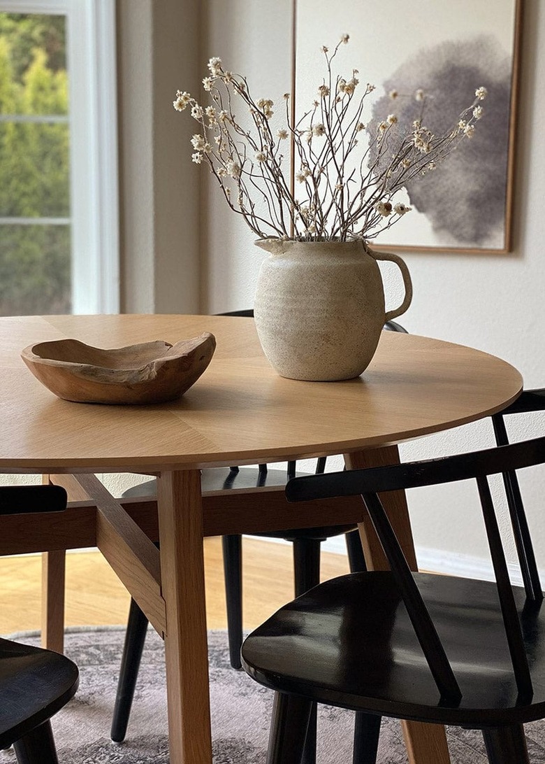 pitcher on table with flowers