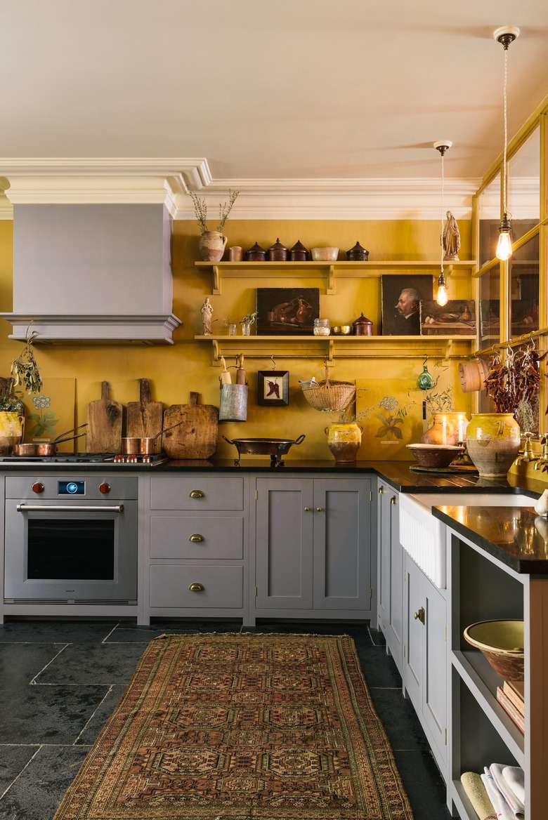 mustard yellow kitchen walls with gray cabinets