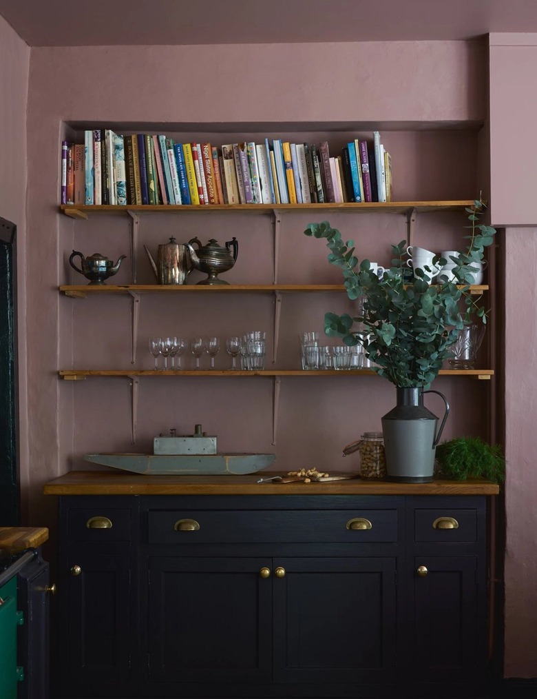 dark lilac kitchen walls with navy blue cabinetry