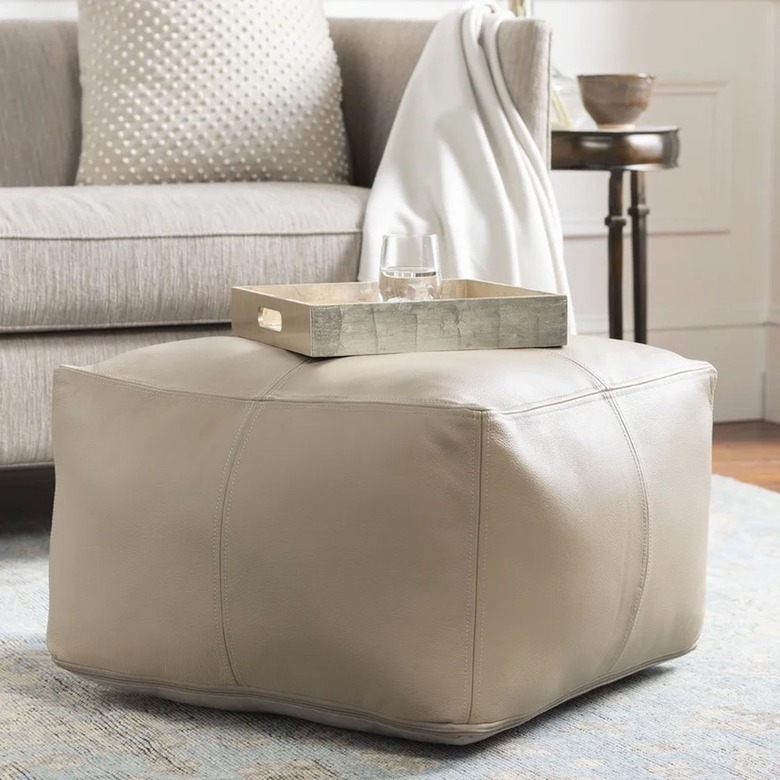 light tan leather pouf