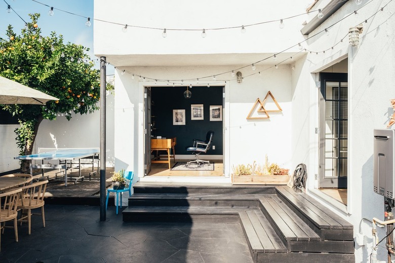 back patio with outdoor lighting