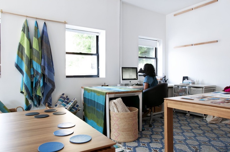 office with blue accents and wood furniture