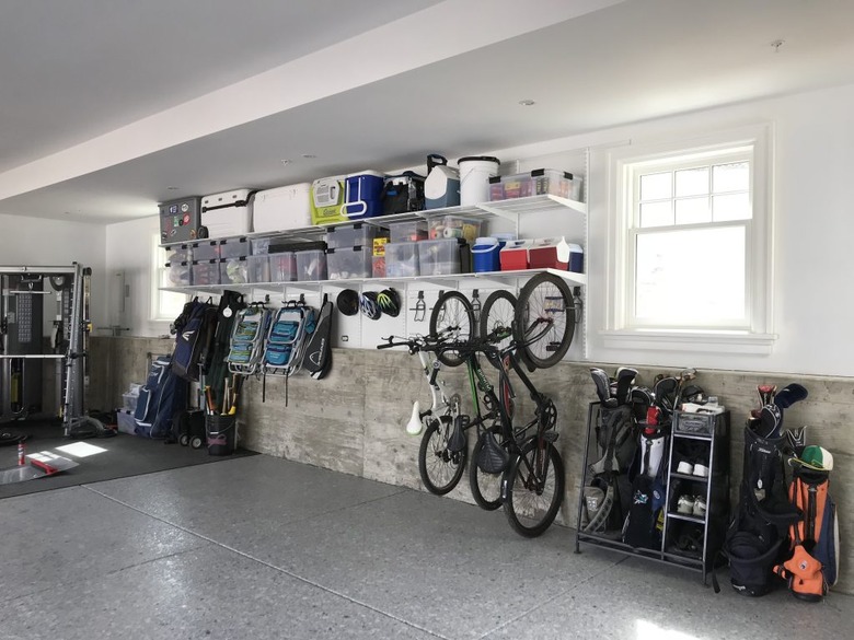 garage storage solution featuring Elfa utility rack for bike storage