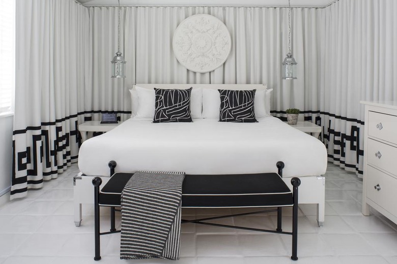 black and white hollywood style bedroom with trellis pattern