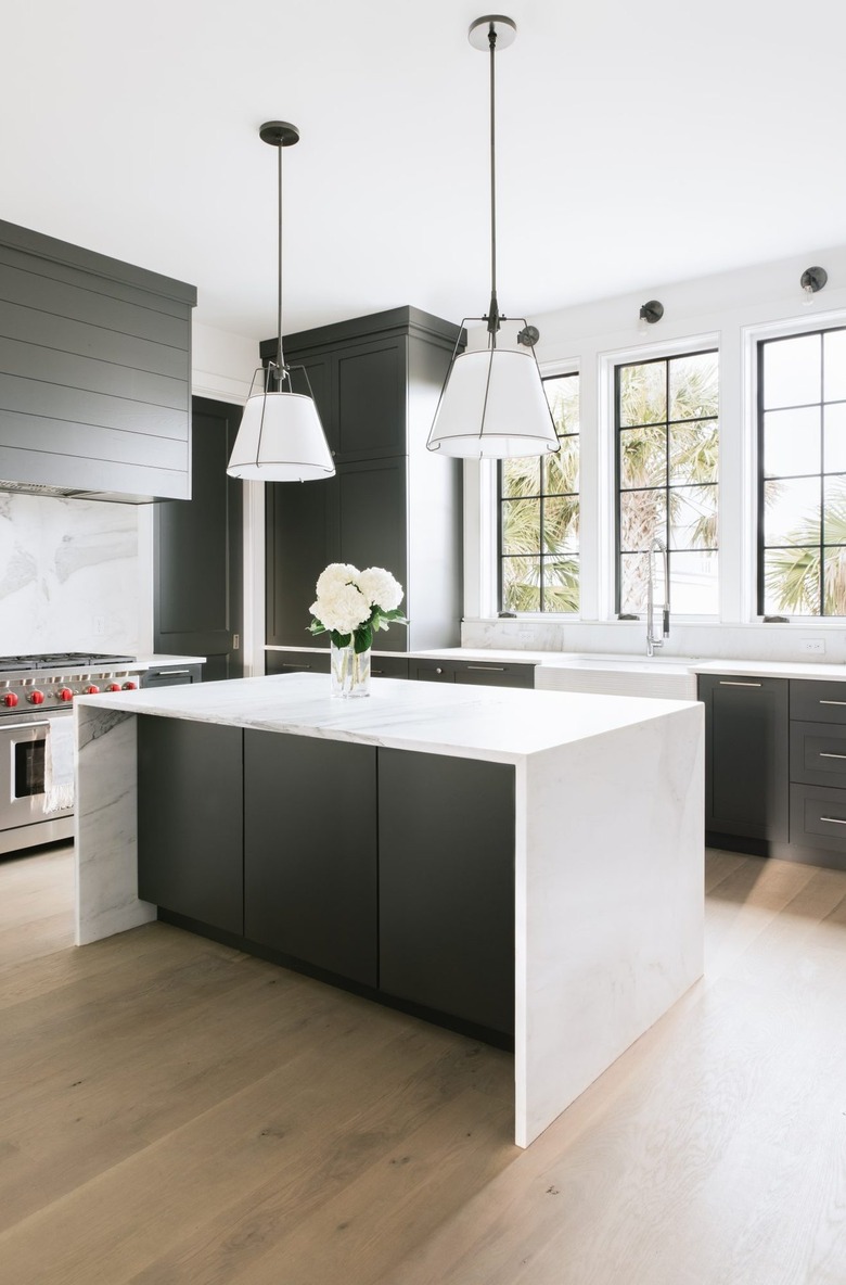 black and white kitchen with factory windows