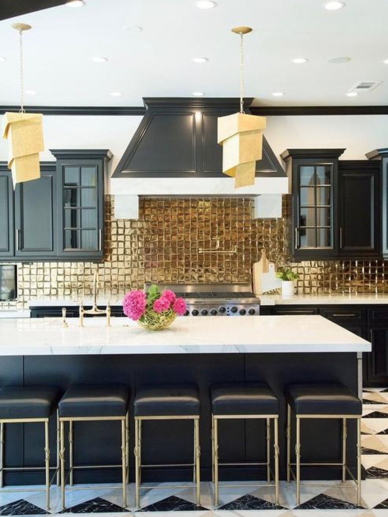 black and white kitchen with gold