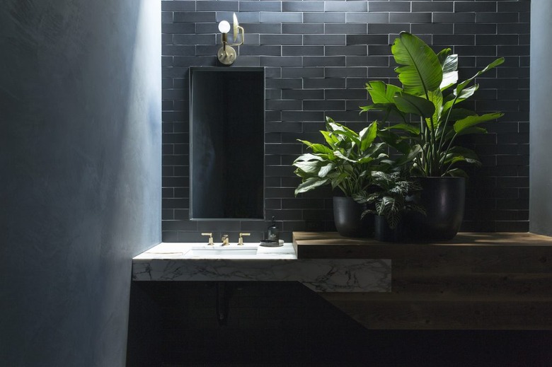 Black bathroom backsplash idea with with custom vanity