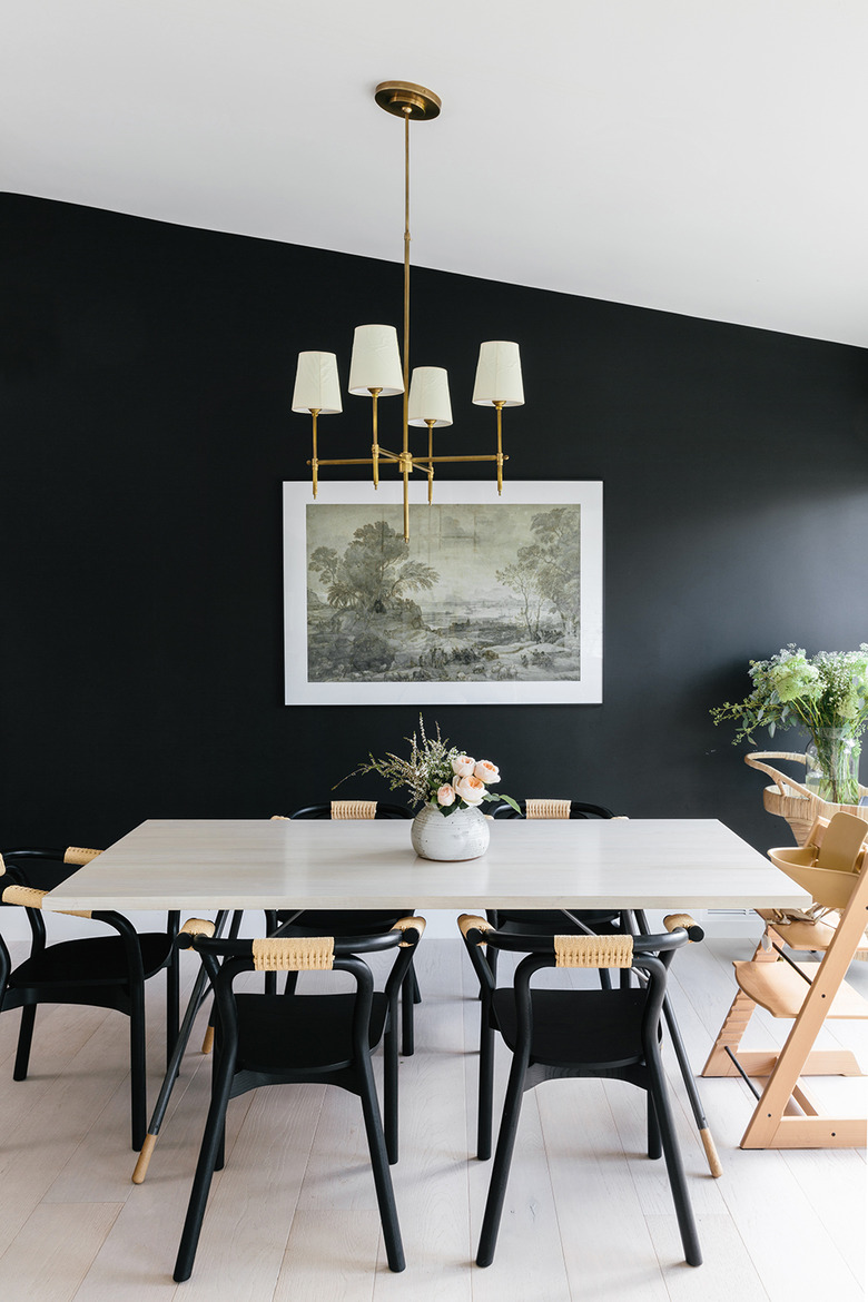 black dining room color idea with white sloped ceiling