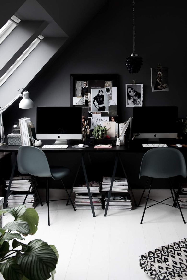 all black home office with modern furniture