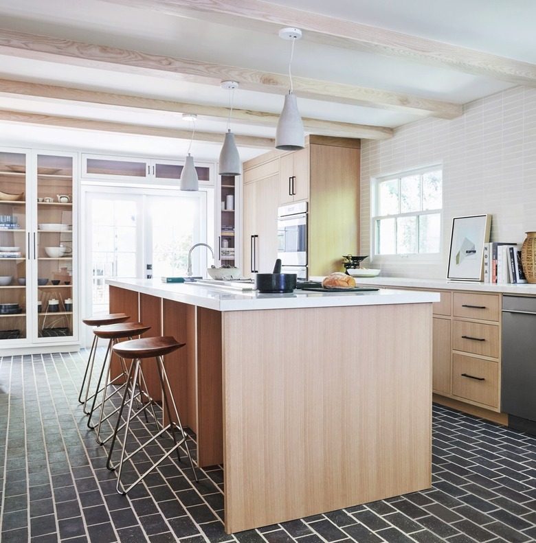 kitchen with black brick floor