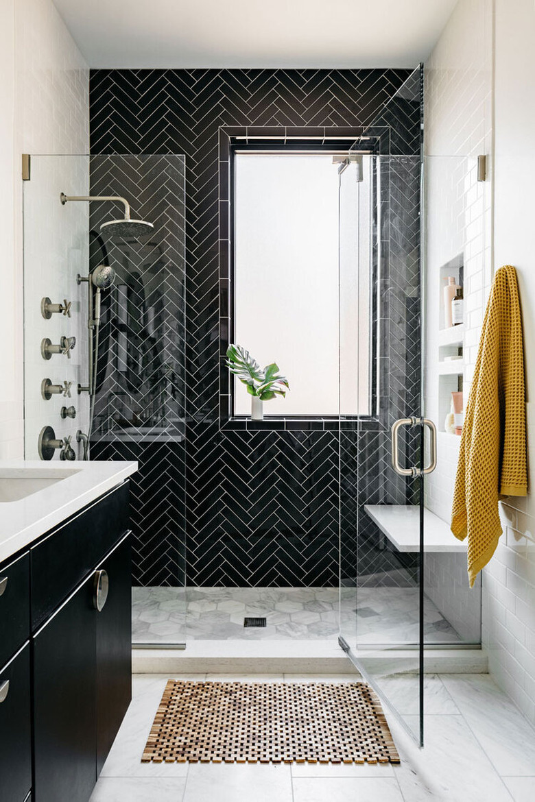 contemporary black tile shower and white walls