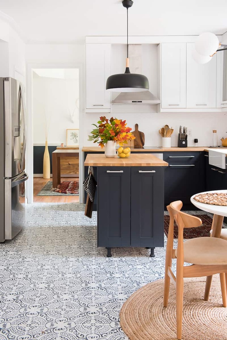 classic navy blue and white kitchen with wood detailing