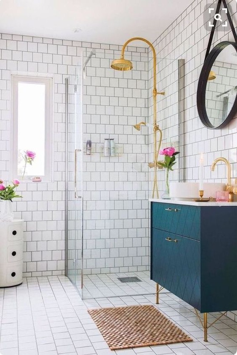 harlequin pattern blue bathroom cabinets with white countertop and vessel sink