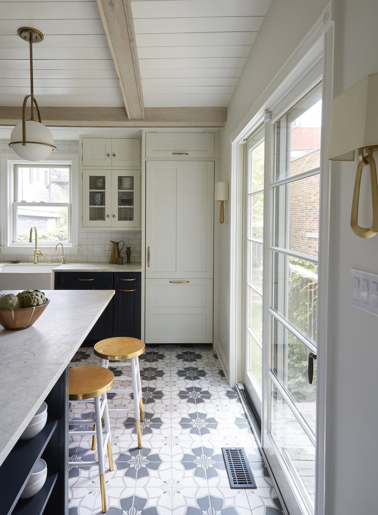 white luxury kitchen with blue kitchen floor tile