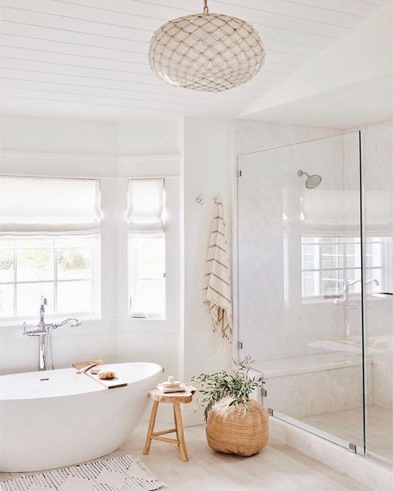 minimal bohemian bathroom lighting idea with capiz shell chandelier