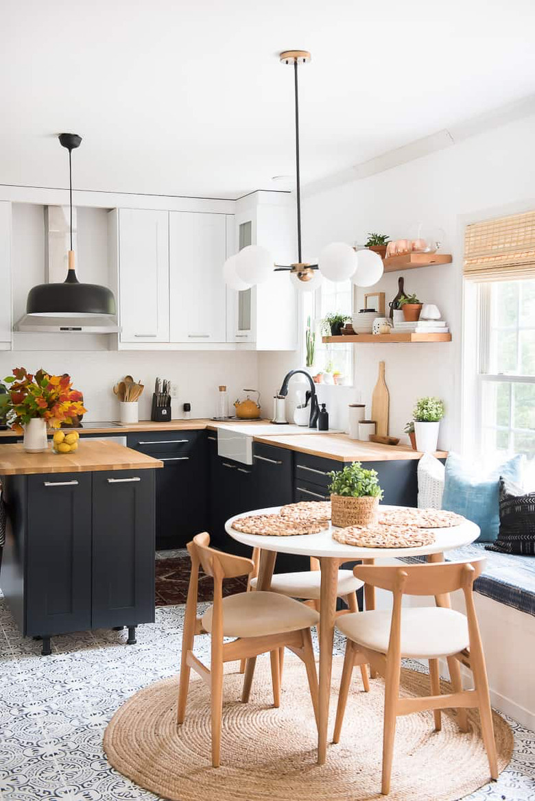 two-toned charcoal bohemian kitchen with pendant lighting and jute details