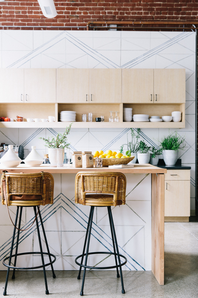 patterned bohemian kitchen with rattan chairs