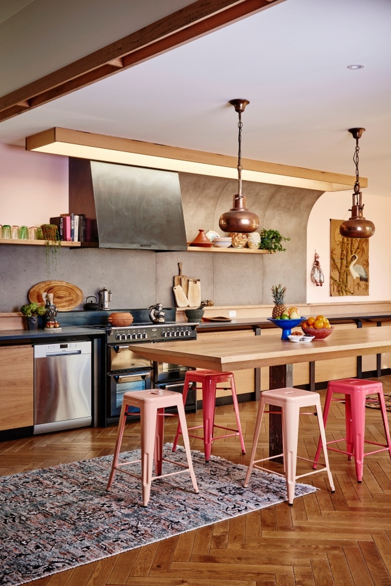 industrial meets bohemian kitchen with colourful stools