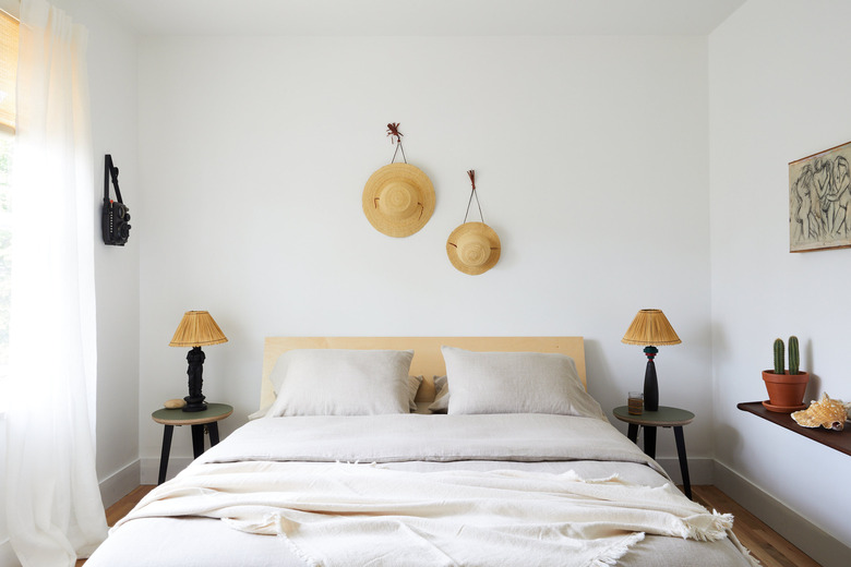 minimal white boho beach bedroom with coastal touches