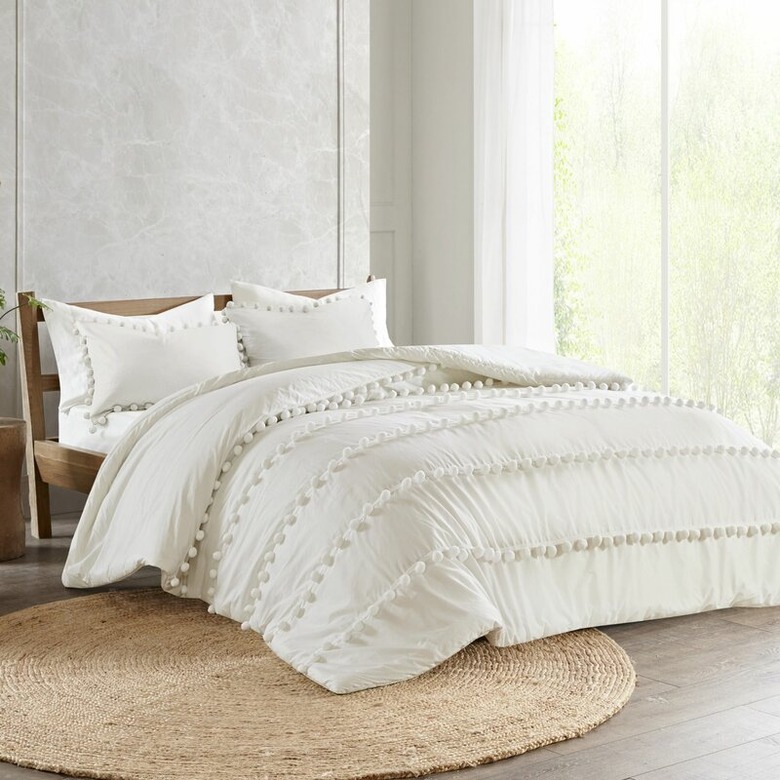 boho bedding with pom poms