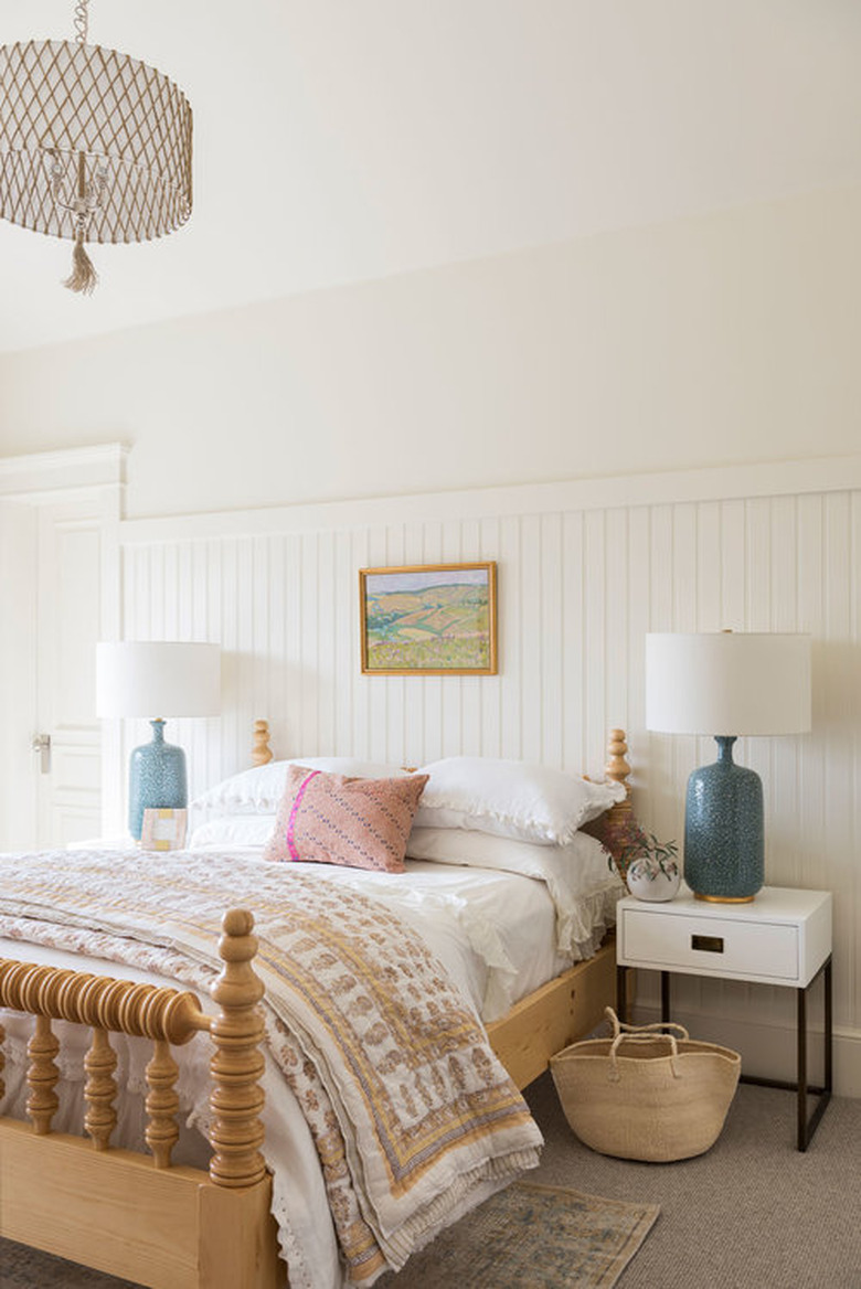 boho girls room with traditional bedroom with hand turned bed