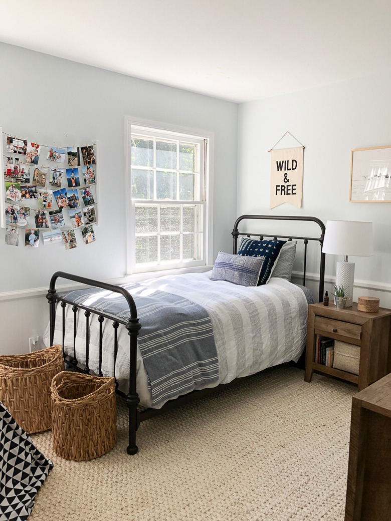 coastal boys bedroom idea with woven baskets and jute rug