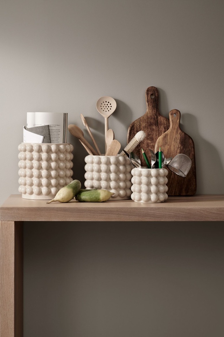 table with bubble-shaped containers and cutting boards