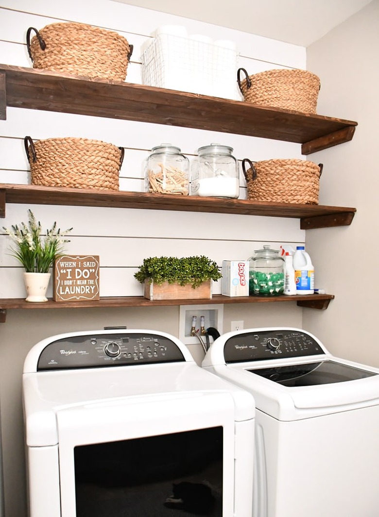 Budget-Friendly Small Laundry Room Ideas in laundry room with diy open shelving and shiplap walls