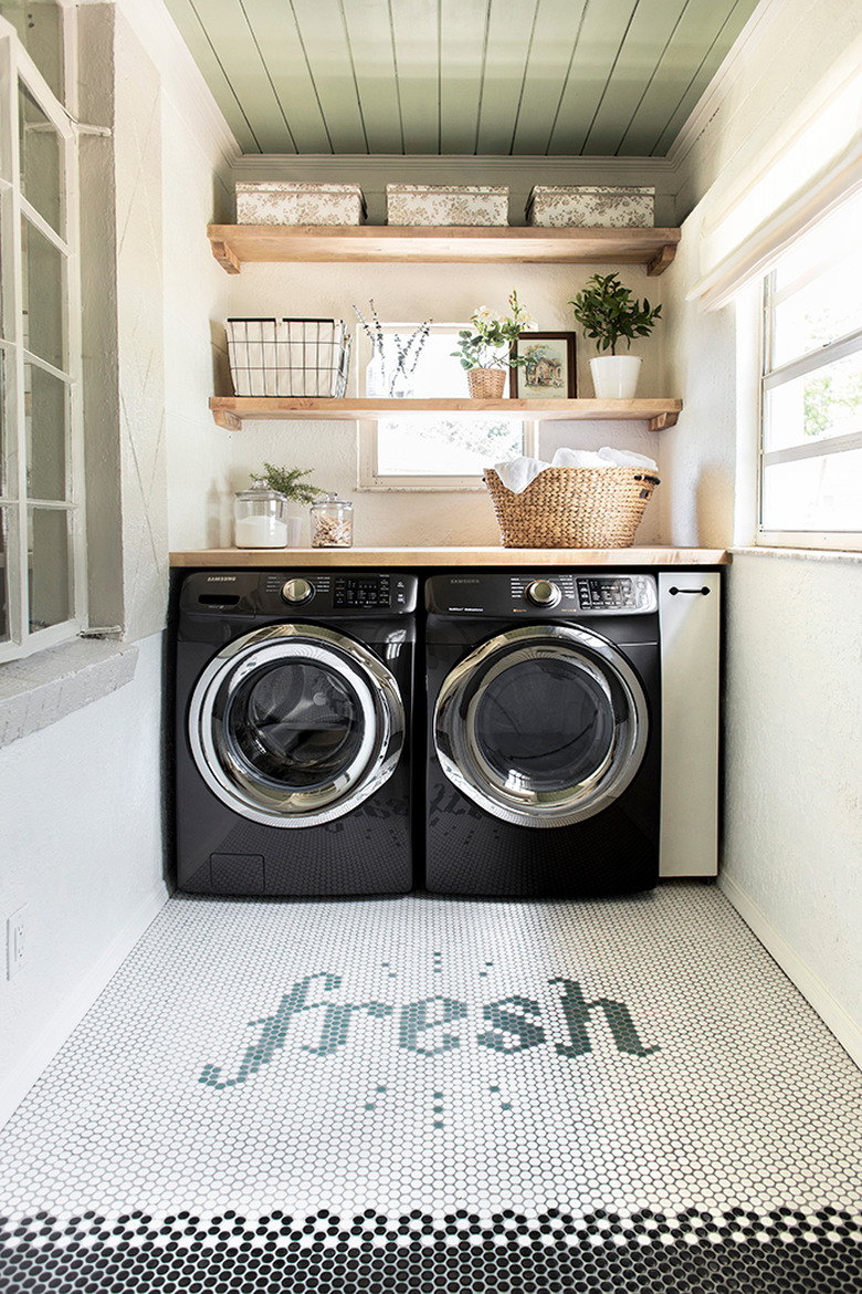 Budget-Friendly Small Laundry Room Ideas in contemporary laundry room with custom penny tile design