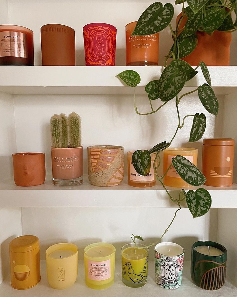 kitchen cubby displaying color coordinated candles