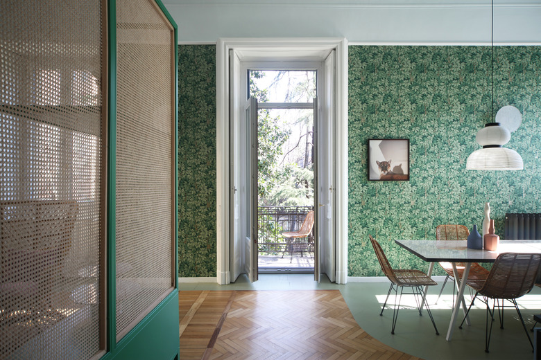 green wallpaper in living room