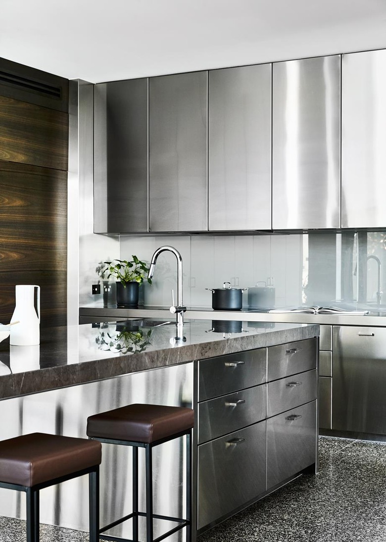 stainless steel kitchen cabinets against walnut