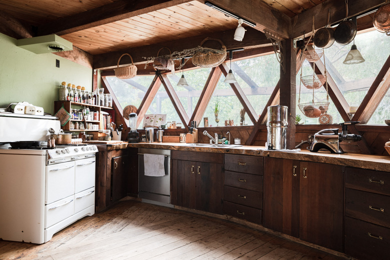 ceramic griddle in wood kitchen with white stove