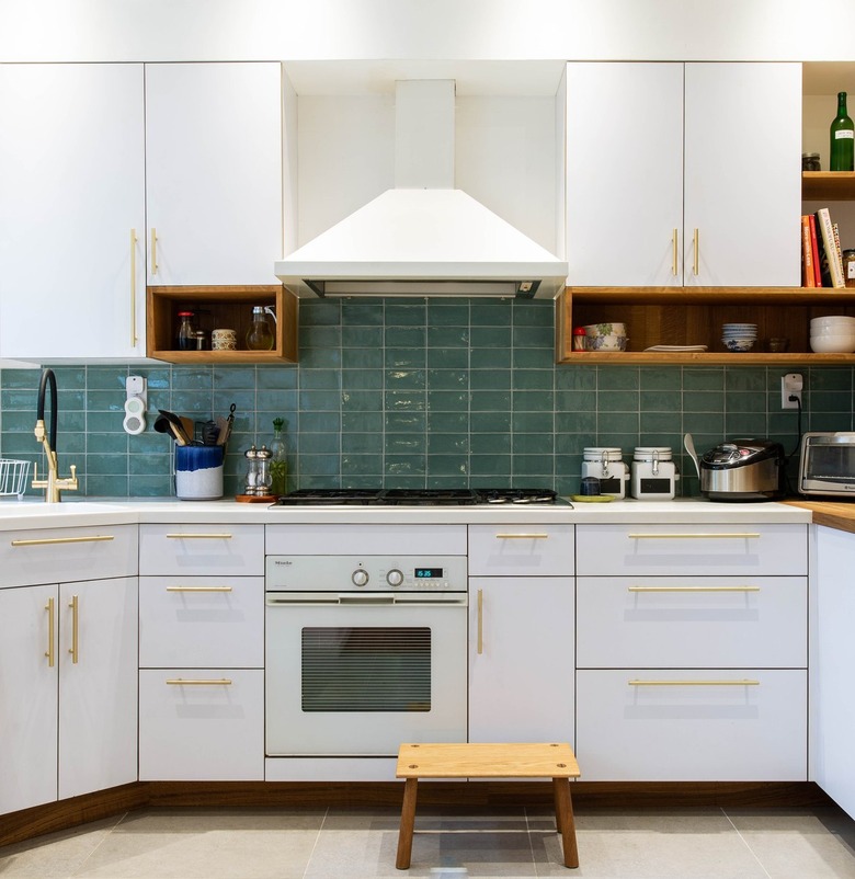 White kitchen with aqua glass subway tiles Ceramic Stovetop Cleaners