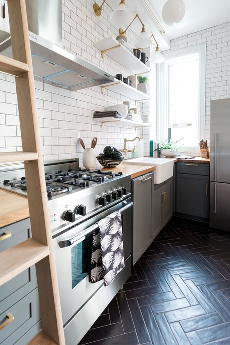 modern kitchen with white subway tile walls and ceramic tile flooring