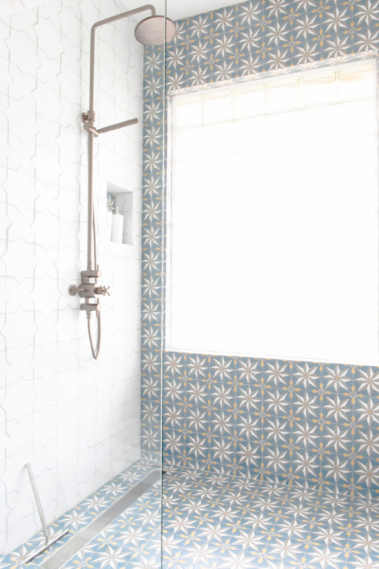 Star patterned tile in master shower.