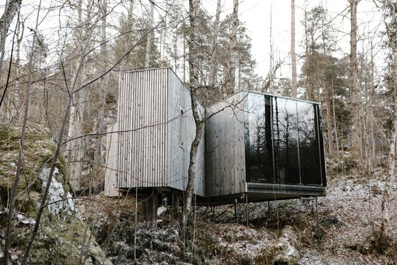 area with lots of trees and Scandinavian style structure