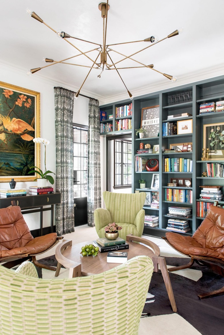 chartreuse color idea in white living room with green lounge chairs