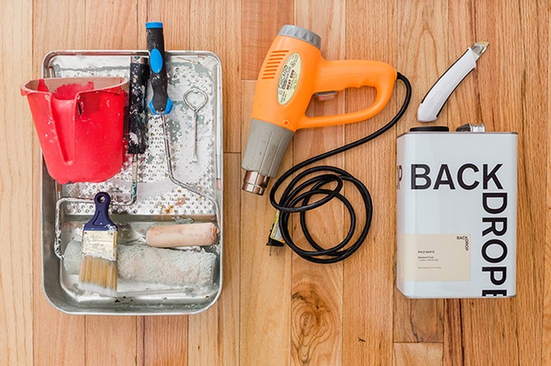 Paint cup, paint tray, paint brush, paint roller, heat gun, utility knife, and container of primer