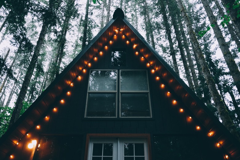 warm Christmas light ideas on A-frame cabin