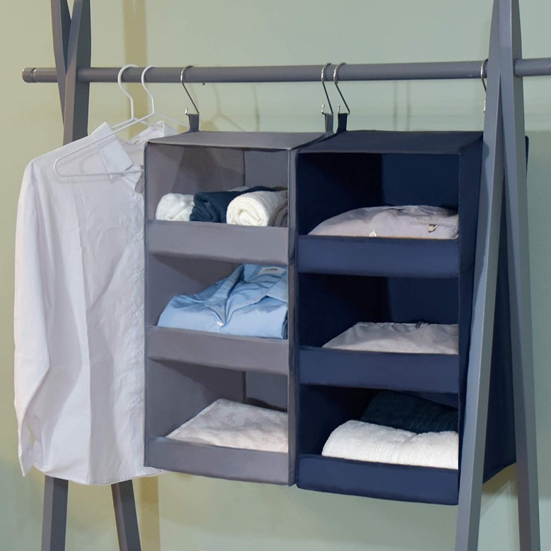 Hanging closet organizers, white shirt, hangers.