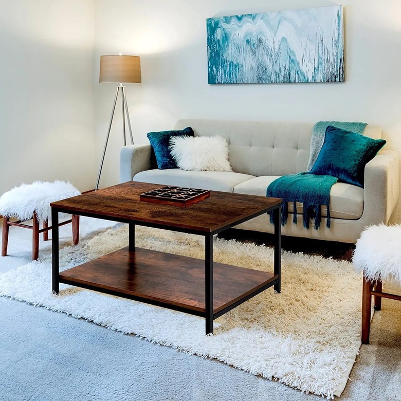 dark wood coffee table with metal legs