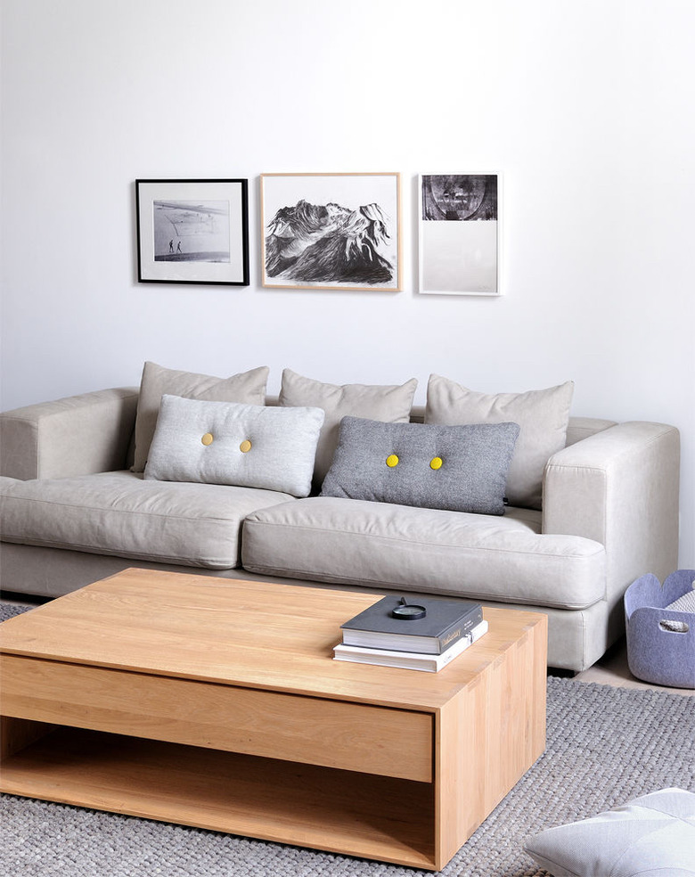 Scandinavian living room with coffee table with storage