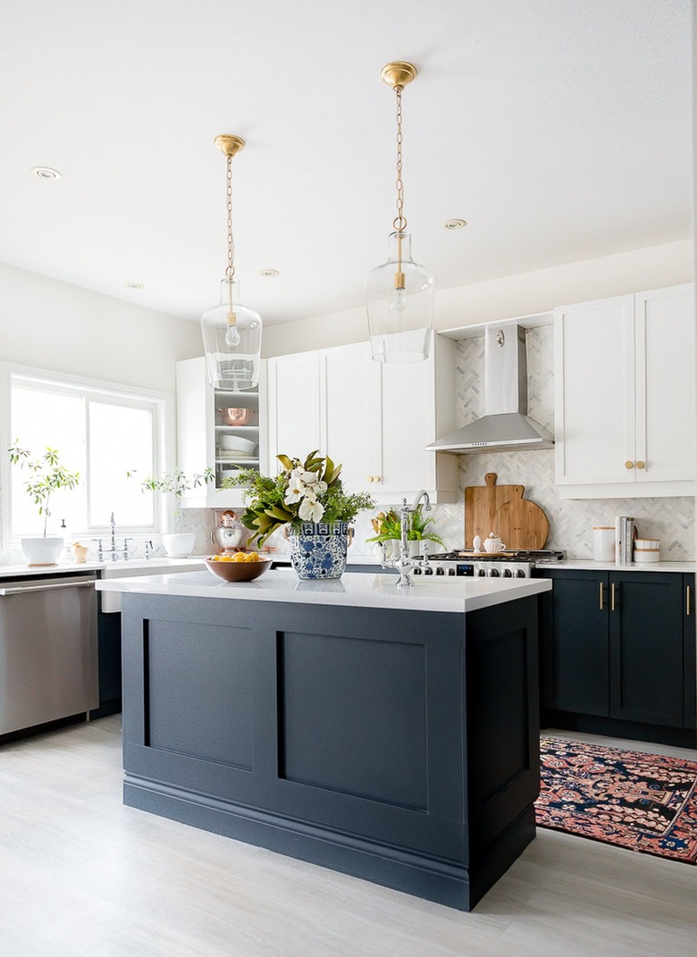 Open kitchen with blue cabinets