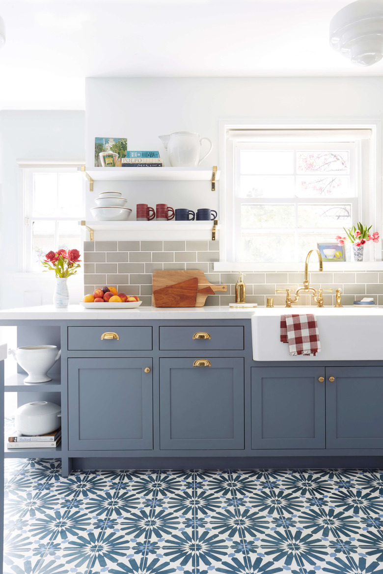 Patterned floor tiles and matching kitchen cabinets