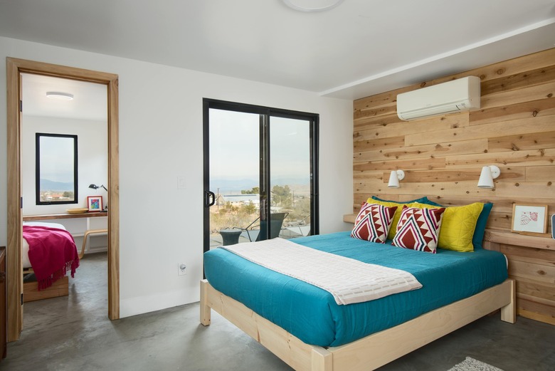 Desert-style bedroom with teal bedspread