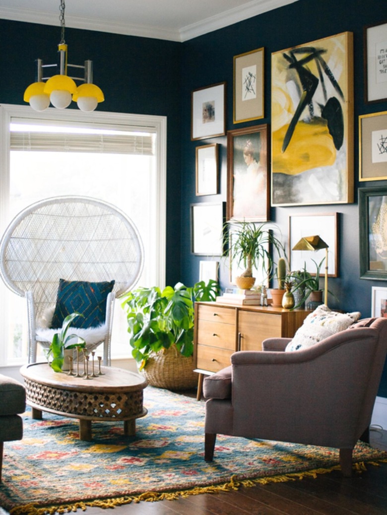 navy blue living room with yellow accents